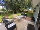 Relaxing backyard patio with seating area at 1615 Martinsville Ct, Orlando, FL 32825
