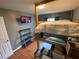 Bedroom with a built-in bunk bed and TV at 1615 Martinsville Ct, Orlando, FL 32825