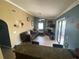 View of the kitchen from the living room at 1615 Martinsville Ct, Orlando, FL 32825