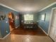 Dining room with hardwood floors and a large table at 1615 Martinsville Ct, Orlando, FL 32825