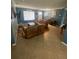 Living room with hardwood floors and a comfortable couch at 1615 Martinsville Ct, Orlando, FL 32825