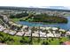 Aerial view of the community with lake access at 3757 Eagle Isle Cir, Kissimmee, FL 34746