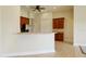 Kitchen with wood cabinets, stainless steel appliances, and an island at 3757 Eagle Isle Cir, Kissimmee, FL 34746
