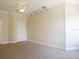 Spacious bedroom with neutral walls, carpeting, and ceiling fan at 3757 Eagle Isle Cir, Kissimmee, FL 34746