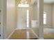 Bright entryway with tile flooring and chandelier at 3757 Eagle Isle Cir, Kissimmee, FL 34746