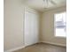 Well-lit bedroom with double-door closet and window at 3757 Eagle Isle Cir, Kissimmee, FL 34746