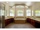 Spacious Primary bathroom with double sinks, large soaking tub, and separate shower at 3757 Eagle Isle Cir, Kissimmee, FL 34746