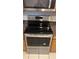 Stainless steel electric range and microwave at 9815 Barley Club Dr # Ge, Orlando, FL 32837