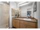Bathroom with shower, vanity, and updated fixtures at 1256 S Beach Cir, Kissimmee, FL 34746
