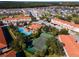 Aerial view of community with tennis courts and pool at 1256 S Beach Cir, Kissimmee, FL 34746