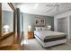 Spacious bedroom with a queen-size bed and lots of natural light at 1256 S Beach Cir, Kissimmee, FL 34746
