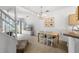 Dining area with chandelier and adjacent kitchen at 1256 S Beach Cir, Kissimmee, FL 34746