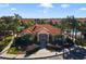 Community clubhouse with tile roof and inviting entryway at 1256 S Beach Cir, Kissimmee, FL 34746