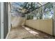 Screened-in patio with tiled floor and ceiling fan at 1256 S Beach Cir, Kissimmee, FL 34746