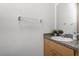 Clean bathroom with vanity, sink, and a mirrored medicine cabinet at 1256 S Beach Cir, Kissimmee, FL 34746