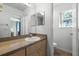 Guest bathroom with toilet and vanity at 1256 S Beach Cir, Kissimmee, FL 34746