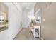 Bright entryway with coat closet and a console table at 1256 S Beach Cir, Kissimmee, FL 34746