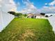 Spacious backyard enclosed by a white fence at 3541 Linnet Ct, Kissimmee, FL 34746