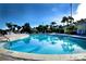 Large community pool with plenty of space for lounging at 306 Lucaya Loop # B5/U306, Davenport, FL 33897