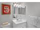 Bathroom with single vanity and a framed butterfly art at 306 Lucaya Loop # B5/U306, Davenport, FL 33897