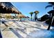Relaxing white sand beach area with a hammock at 306 Lucaya Loop # B5/U306, Davenport, FL 33897