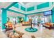 Bright and spacious lobby with comfortable seating and tropical decor at 306 Lucaya Loop # B5/U306, Davenport, FL 33897