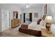 Main bedroom with king-size bed and en-suite bathroom at 306 Lucaya Loop # B5/U306, Davenport, FL 33897