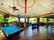 Relax in this casual bar with a pool table and large screen TV at 306 Lucaya Loop # B5/U306, Davenport, FL 33897