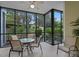 Enclosed patio with seating area, great for relaxing and enjoying the outdoors at 306 Lucaya Loop # B5/U306, Davenport, FL 33897