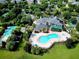 Resort-style pool with surrounding lounge chairs and splash pad at 306 Lucaya Loop # B5/U306, Davenport, FL 33897