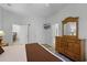 Bedroom with two twin beds, dresser, and access to a bathroom at 306 Lucaya Loop # B5/U306, Davenport, FL 33897
