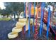 Fun playground with tire climb, slide, and swings at 306 Lucaya Loop # B5/U306, Davenport, FL 33897