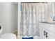 Simple bathroom with shower/tub combo and white vanity at 4350 E Hinson Ave, Haines City, FL 33844