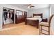 Bedroom with a full bed, lots of closet space, and wood floors at 4350 E Hinson Ave, Haines City, FL 33844