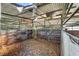 Empty barn stall with wood and metal framing at 4350 E Hinson Ave, Haines City, FL 33844