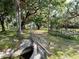 Property entrance with a wooden bridge over a culvert at 4350 E Hinson Ave, Haines City, FL 33844
