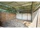 Empty barn stall with wood and metal framing at 4350 E Hinson Ave, Haines City, FL 33844