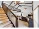 Wooden staircase leading to upper level loft area at 4350 E Hinson Ave, Haines City, FL 33844