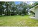 Spacious backyard with grassy area and shed at 424 Wilder Rd, Lakeland, FL 33809