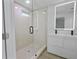 Modern bathroom with a glass shower and double vanity at 424 Wilder Rd, Lakeland, FL 33809