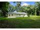 Rear view of a newly built home showcasing its exterior at 424 Wilder Rd, Lakeland, FL 33809
