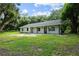 Charming house exterior with a covered porch at 424 Wilder Rd, Lakeland, FL 33809