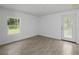 Bedroom with window, tile floor and neutral decor at 424 Wilder Rd, Lakeland, FL 33809