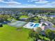Community features tennis courts, pool, playground, and open green space at 5232 Deer Creek Dr, Orlando, FL 32821