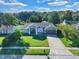House with a gray exterior and a large green lawn at 5232 Deer Creek Dr, Orlando, FL 32821