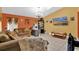 Relaxing living room with a large TV and comfortable seating at 5232 Deer Creek Dr, Orlando, FL 32821