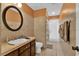 Bathroom with single vanity and walk-in shower at 5232 Deer Creek Dr, Orlando, FL 32821