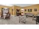 Bright dining room featuring a formal dining set and decorative cabinetry at 5232 Deer Creek Dr, Orlando, FL 32821