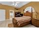 Spacious bedroom with ensuite bathroom and walk-in closet at 5232 Deer Creek Dr, Orlando, FL 32821