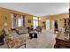 Spacious living room with ample seating and large windows at 5232 Deer Creek Dr, Orlando, FL 32821